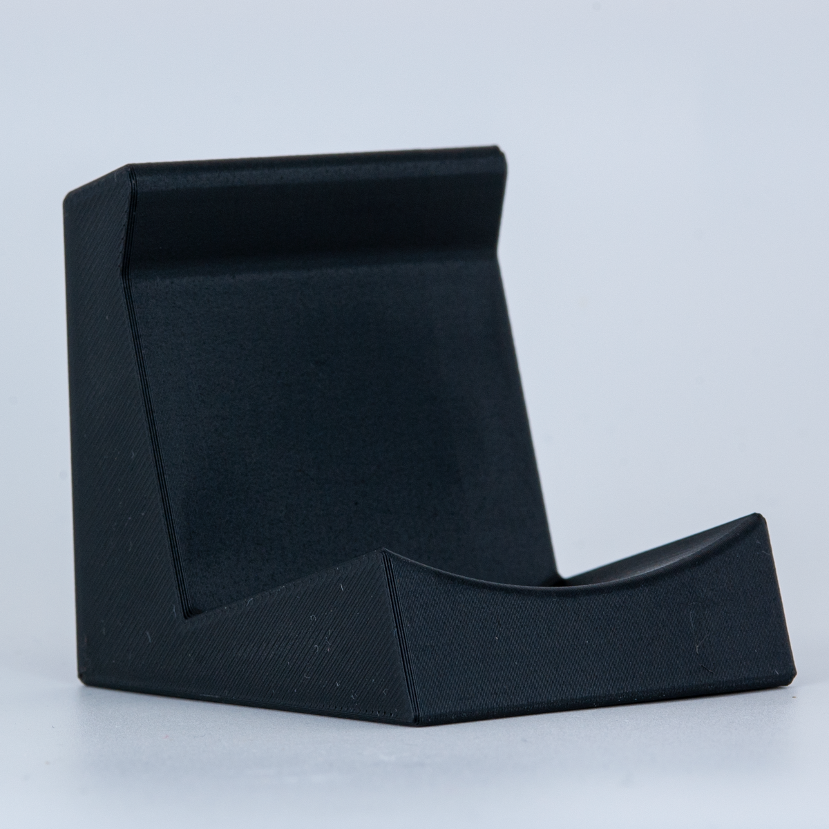 Closeup detailed view of a black shave of the day soap stand