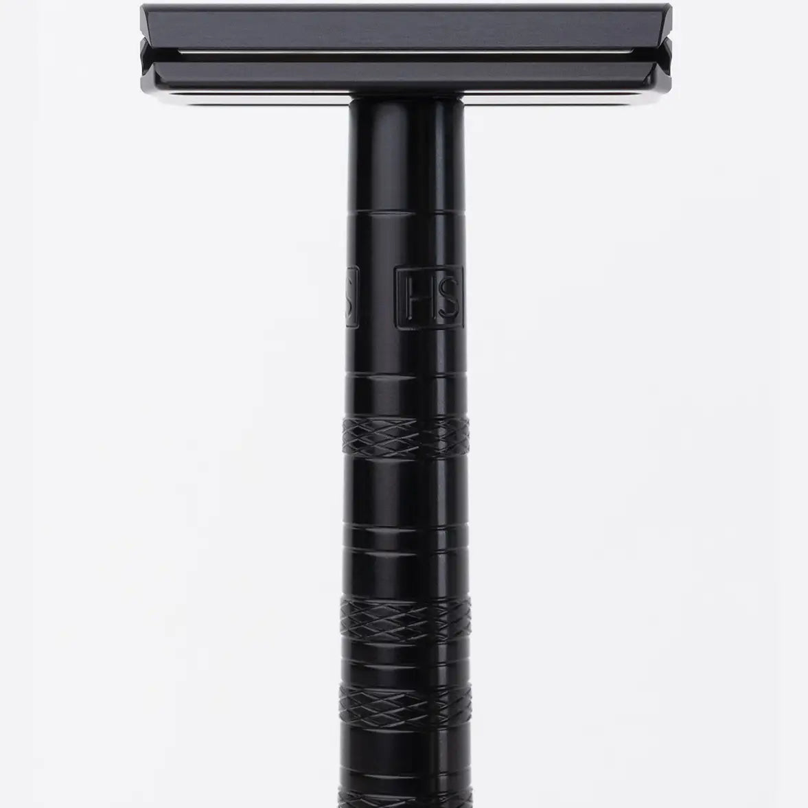 Black aluminum Henson AL13 double-edge safety razor with knurled handle and HS logo, close-up front view