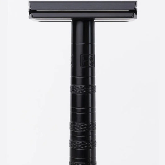 Black aluminum Henson AL13 double-edge safety razor with knurled handle and HS logo, close-up front view
