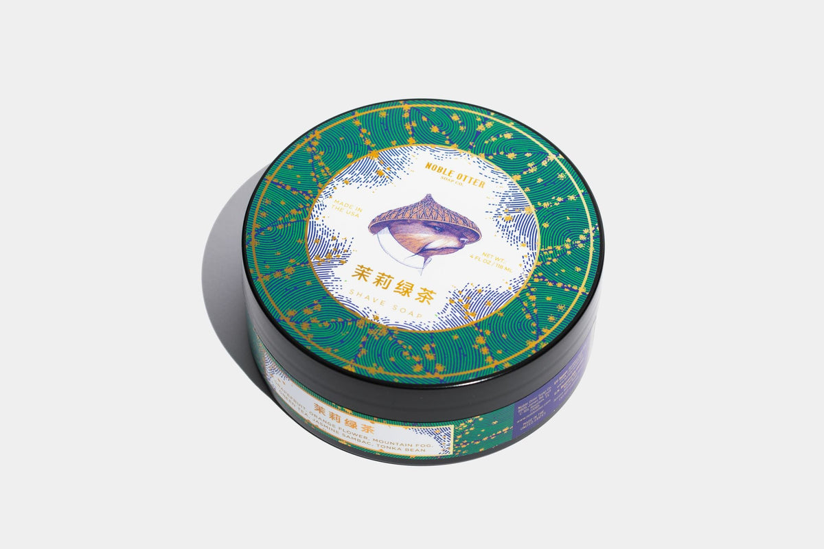 Round green tea themed shave shop tub with decorative design on a white background