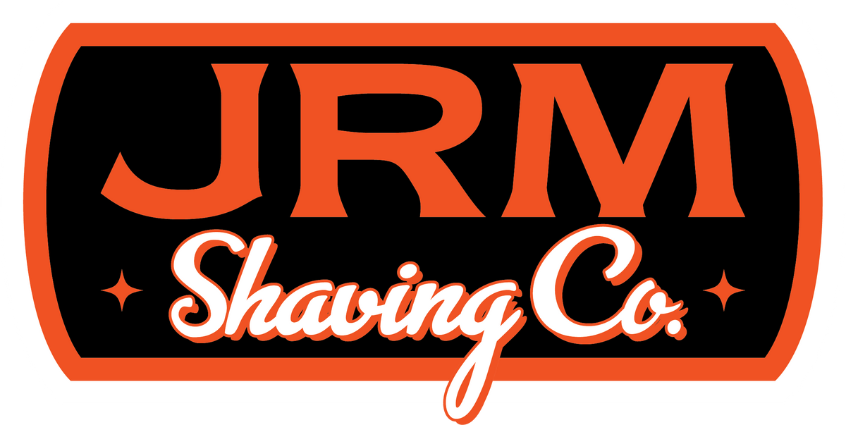 JRM Shaving Co. logo in orange, black, and white on a rounded rectangle background