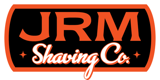JRM Shaving Co. logo in orange, black, and white on a rounded rectangle background