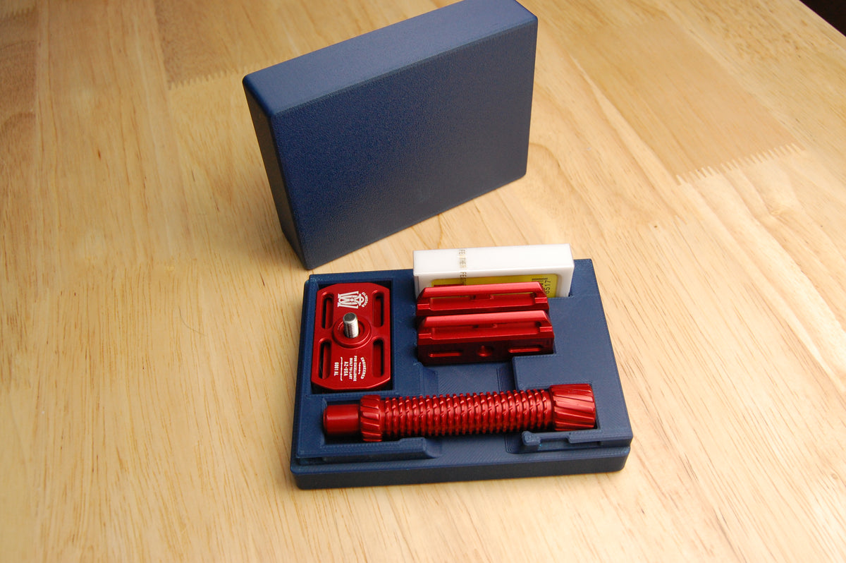 Red Oliworks M3teorite in a Navy Blue travel case.  