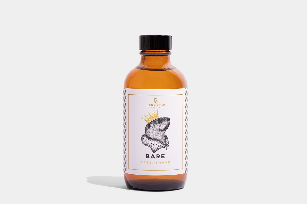 Bottle of Bare Aftershave with a label on a white background