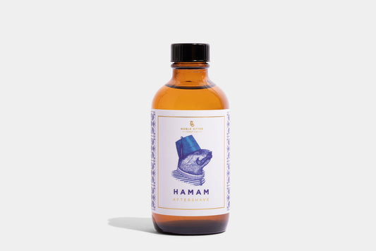 Noble Otter Aftershave "Hamam" with a white and blue decorative label  on a white background.