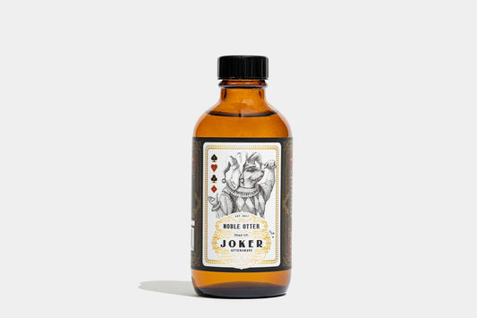 Noble Otter Shave Soap "Joker" with a white and gold decorative label on a white background.