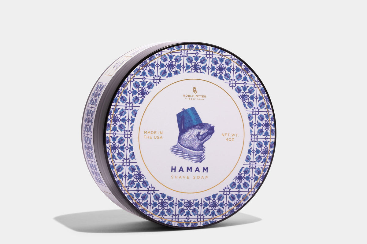 Noble Otter Shave Soap "Hamam" with a blue and white decorative label on a white background.