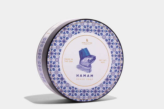 Noble Otter Shave Soap "Hamam" with a blue and white decorative label on a white background.