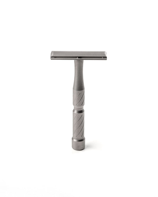 Vector Titanium double-edge safety razor with matte gray titanium finish and diagonal-grooved handle