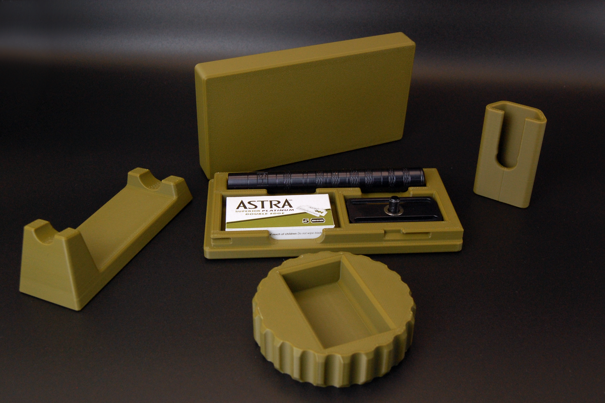Henson razor bundle in army green on black background.  Includes Henson Case, Henson Cover, razor stand, razor refueler. Razor not included.