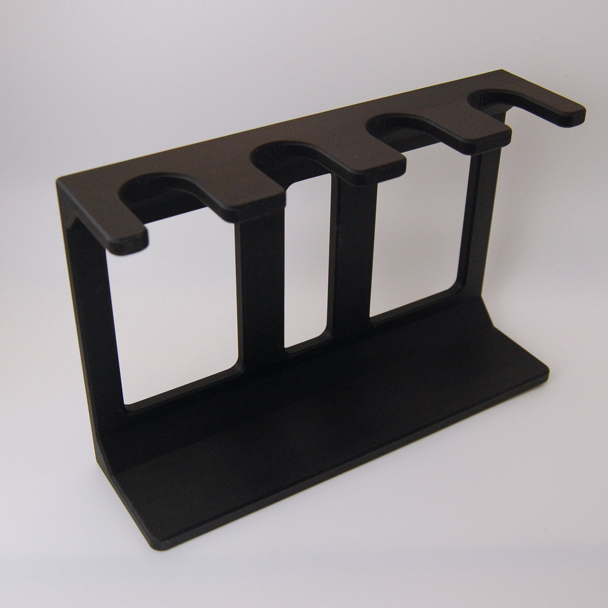 Black Shaving Brush stand on a white background.