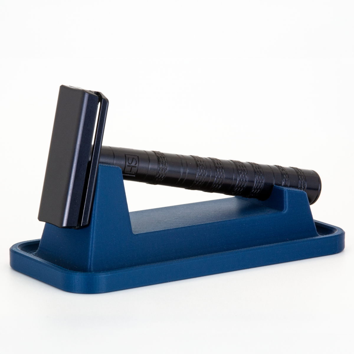 Navy Blue Universal Safety Razor Stand with drip tray, holding a Jet Black Henson AL13 head-up on white